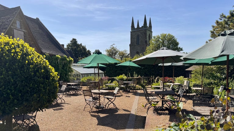 View of the church from the tearoom garden, Canons Ashby, Northamptonshire